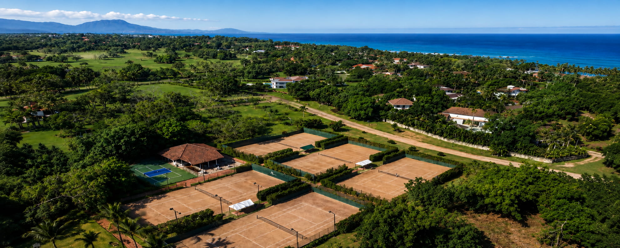 Tennis coaching session on clay courts in Cabarete